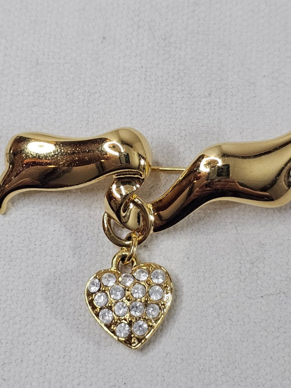 Monet Gold Tone Ribbon Brooch Dangling Heart Clear Rhinestone Jewelry Pin